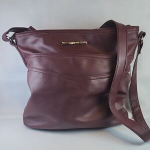 Rosetti Burgundy Crossbody Bag with Brass Tone Accent Clearance